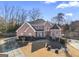 Brick house with a large front yard and driveway at 295 Camden Creek Ct, Lawrenceville, GA 30043