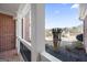 Brick front porch with view of neighborhood at 295 Camden Creek Ct, Lawrenceville, GA 30043