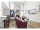Two-story Gathering room with fireplace and hardwood floors at 295 Camden Creek Ct, Lawrenceville, GA 30043