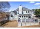 Two story house exterior with deck, showcasing backyard and landscaping at 295 Camden Creek Ct, Lawrenceville, GA 30043