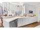 Modern kitchen with stainless steel appliances and breakfast bar at 295 Camden Creek Ct, Lawrenceville, GA 30043