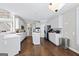 Bright kitchen featuring ample cabinetry, hardwood floors, and an island at 295 Camden Creek Ct, Lawrenceville, GA 30043