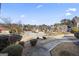 View of a quiet, tree-lined neighborhood at 295 Camden Creek Ct, Lawrenceville, GA 30043
