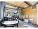 Bright sunroom with stone fireplace and abundant natural light at 295 Camden Creek Ct, Lawrenceville, GA 30043
