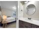 Small bathroom with vanity and view of bedroom at 10 Plum Blossom Ln, Hampton, GA 30228