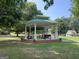Community gazebo with seating and picnic tables at 10 Plum Blossom Ln, Hampton, GA 30228