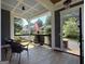 Relaxing front porch with seating and view of street at 10 Plum Blossom Ln, Hampton, GA 30228