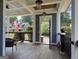 Front porch with American flag and view of the neighborhood at 10 Plum Blossom Ln, Hampton, GA 30228