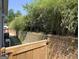 Side yard with gate and landscaping at 10 Plum Blossom Ln, Hampton, GA 30228
