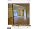 Bright basement room with wood floors and sliding door at 6045 Winview Dr, Forest Park, GA 30297