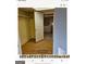 Open door to a basement bathroom and closet at 6045 Winview Dr, Forest Park, GA 30297