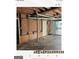 Unfinished basement with workbench and storage at 6045 Winview Dr, Forest Park, GA 30297