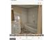 Basement bathroom with bathtub and tiled walls at 6045 Winview Dr, Forest Park, GA 30297