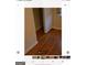 Simple bedroom with hardwood floors and a closet at 6045 Winview Dr, Forest Park, GA 30297