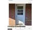 White exterior door with glass panels at 6045 Winview Dr, Forest Park, GA 30297