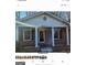 Brick ranch house with covered porch and columns at 6045 Winview Dr, Forest Park, GA 30297
