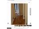 Hardwood floors in a long hallway at 6045 Winview Dr, Forest Park, GA 30297