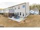Townhouse backyard with patio, grill, and seating area at 4937 Lower Elm St, South Fulton, GA 30349