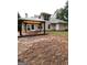 Home's backyard with gazebo and patio at 161 Revolutionary Dr, Hampton, GA 30228