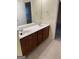 Primary bathroom with double vanity and a large mirror at 161 Revolutionary Dr, Hampton, GA 30228