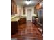 Kitchen with stainless steel appliances and dark wood cabinets at 161 Revolutionary Dr, Hampton, GA 30228