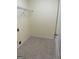 Laundry room with tile flooring and shelving at 161 Revolutionary Dr, Hampton, GA 30228