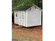 White shed with double doors and ramp at 161 Revolutionary Dr, Hampton, GA 30228