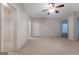 Bedroom with carpet, ceiling fan, walk-in closet, and window at 340 Antebellum Way, Fayetteville, GA 30215