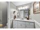 Simple basement bathroom, featuring a white vanity and mirror at 248 Montrose Dr, Mcdonough, GA 30253