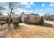 Brick home with a private backyard and mature landscaping at 180 Lagrange Ct, Fayetteville, GA 30214