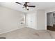 Bedroom with neutral walls, ceiling fan, double hung window and closet with double doors at 180 Lagrange Ct, Fayetteville, GA 30214