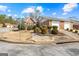Charming single-story brick home featuring an attached two-car garage and manicured landscaping in a suburban neighborhood at 180 Lagrange Ct, Fayetteville, GA 30214