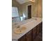 Double vanity bathroom with tiled floors and a bathtub at 20 Pond Ct, Stockbridge, GA 30281