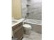 Bathroom with a bathtub, toilet, and vanity at 62 Haver Dr, Riverdale, GA 30274