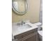 Bathroom with vanity, sink, and large mirror at 62 Haver Dr, Riverdale, GA 30274