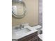 Bathroom with vanity, sink, and large mirror at 62 Haver Dr, Riverdale, GA 30274