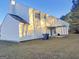 Two-story house with backyard patio and covered porch at 62 Haver Dr, Riverdale, GA 30274