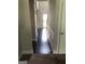 Hallway features dark wood floors, neutral walls, and white trim at 284 Madison Grace Ave, Mcdonough, GA 30252