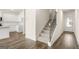 Bright interior featuring a staircase and modern flooring, showcasing the home's contemporary design at 321 Sound Cir # 138, Stockbridge, GA 30281