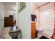 Bathroom with shower, sink, and vanity, accessible through a doorway at 1391 Lakeview Pkwy, Villa Rica, GA 30180