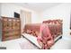 Bright bedroom with matching dresser and television, creating a cozy retreat at 1391 Lakeview Pkwy, Villa Rica, GA 30180