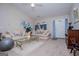 Bright living room with vaulted ceiling and comfy seating at 1391 Lakeview Pkwy, Villa Rica, GA 30180