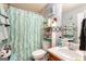 Clean bathroom with a tub shower and vanity at 106 Old Gettysburg Way, Dallas, GA 30157