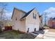 Two-story house with a two-car garage, side view at 106 Old Gettysburg Way, Dallas, GA 30157