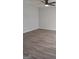 Spacious living room with ceiling fan and vinyl flooring at 1059 Garibaldi Sw St, Atlanta, GA 30310