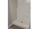 Clean shower with tiled walls and built-in seat at 1059 Garibaldi Sw St, Atlanta, GA 30310