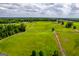Aerial view of property showing large pastures at 3170 Double Bridges Rd, Rutledge, GA 30663