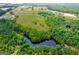 Aerial view of property with pond and pastures at 3170 Double Bridges Rd, Rutledge, GA 30663