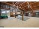 Barn interior with stalls and ample storage space at 3170 Double Bridges Rd, Rutledge, GA 30663