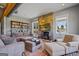 Cozy living area with stone fireplace and access to backyard at 3170 Double Bridges Rd, Rutledge, GA 30663
